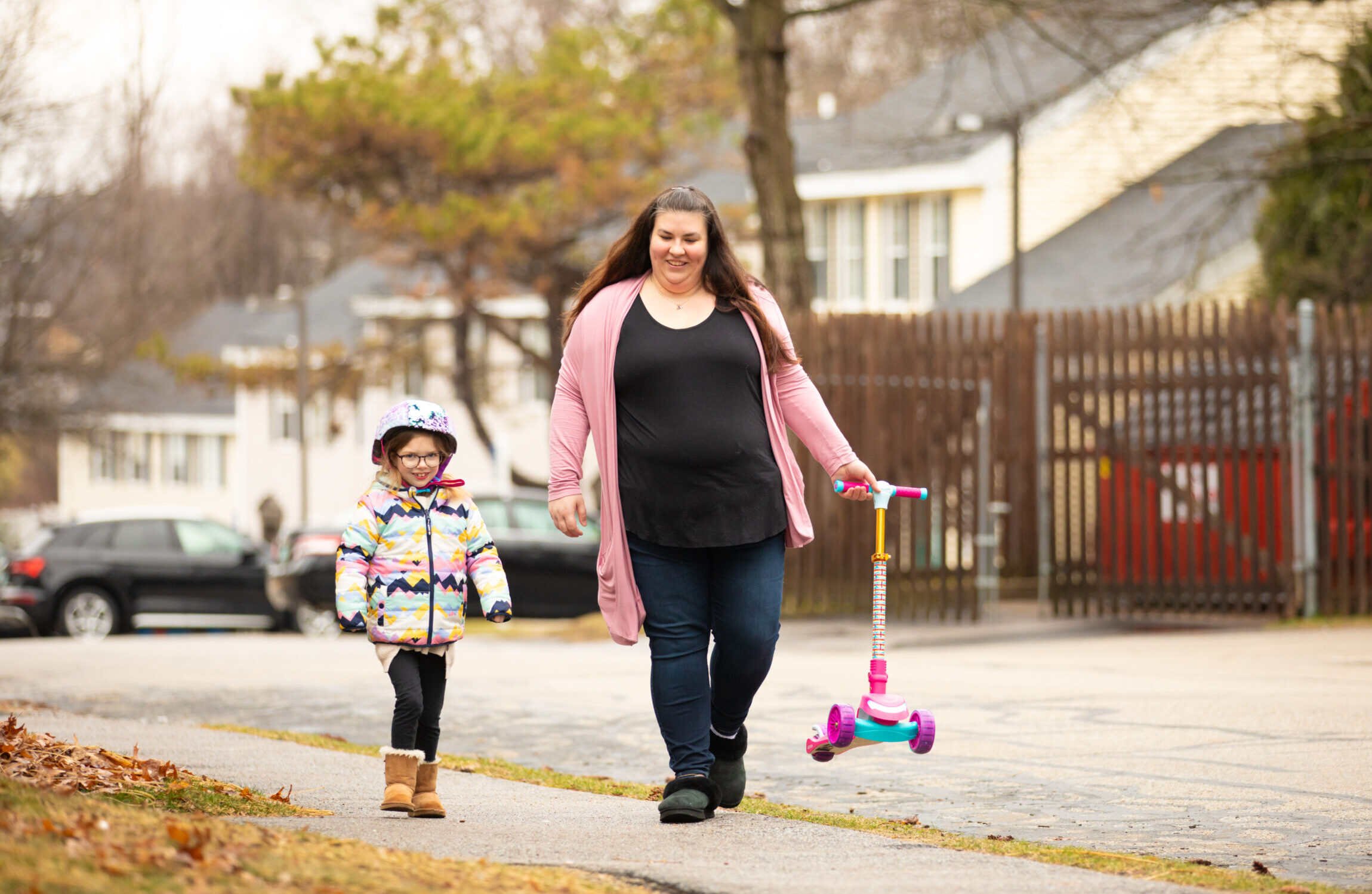 Mother and daughter enjoying a walk years after the child’s life-saving surgery